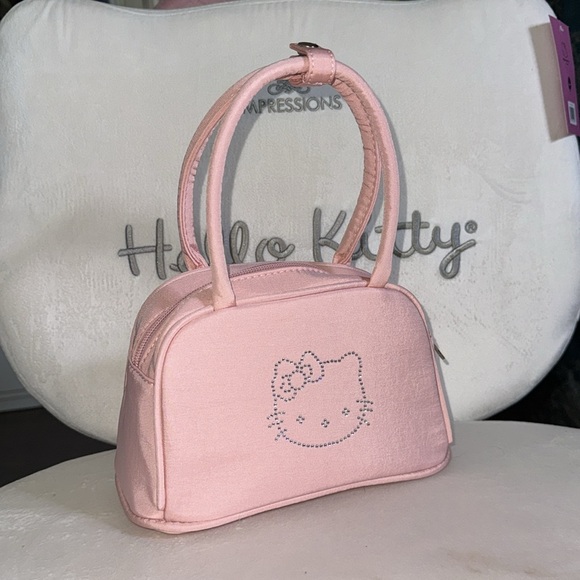 Hello Kitty Handbags - Hello kitty mini purse NWOT
